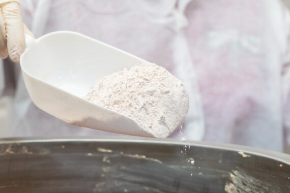 powder induction powder incorporation for high shear mixing